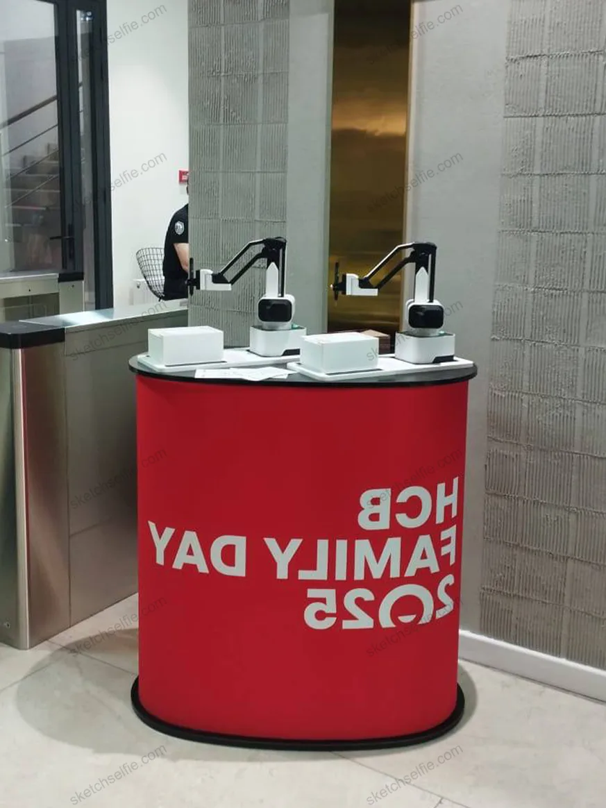 two sketch robots at trade show