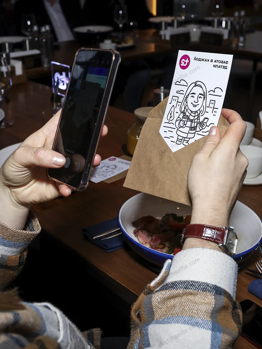 event visitor photographing finished sketch